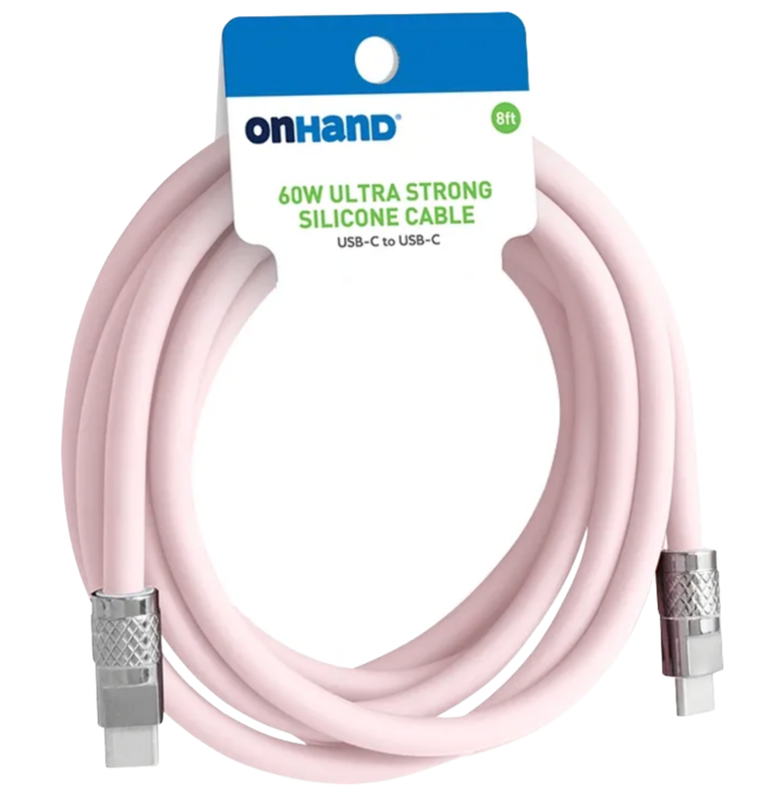 Pink USB-C to USB-C cable with metallic connectors, coiled, and attached to product packaging.